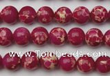 CDE2033 15.5 inches 4mm round dyed sea sediment jasper beads