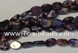 CDE414 15.5 inches 6*8mm oval dyed sea sediment jasper beads