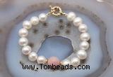 CFB1024 Hand-knotted 9mm - 10mm potato white freshwater pearl & pink opal bracelet