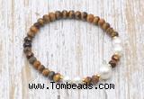 CFB768 faceted rondelle yellow tiger eye & potato white freshwater pearl stretchy bracelet