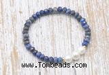 CFB773 faceted rondelle lapis lazuli & potato white freshwater pearl stretchy bracelet