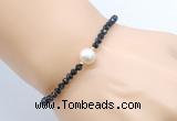 CFB825 4mm faceted round black tourmaline & potato white freshwater pearl bracelet