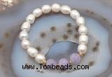 CFB902 9mm - 10mm rice white freshwater pearl & lavender amethyst stretchy bracelet