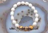 CFB914 9mm - 10mm rice white freshwater pearl & golden tiger eye stretchy bracelet