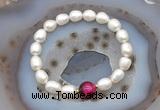 CFB916 9mm - 10mm rice white freshwater pearl & red tiger eye stretchy bracelet