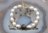 CFB966 Hand-knotted 9mm - 10mm rice white freshwater pearl & golden obsidian bracelet