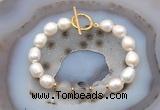 CFB972 Hand-knotted 9mm - 10mm rice white freshwater pearl & montana agate bracelet