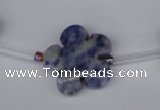 CFG1006 15.5 inches 20mm carved flower blue spot stone beads