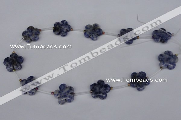 CFG1006 15.5 inches 20mm carved flower blue spot stone beads