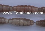 CFG755 15.5 inches 10*30mm carved rice natural moonstone beads