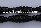 CFG760 15.5 inches 10*30mm carved rice black agate beads