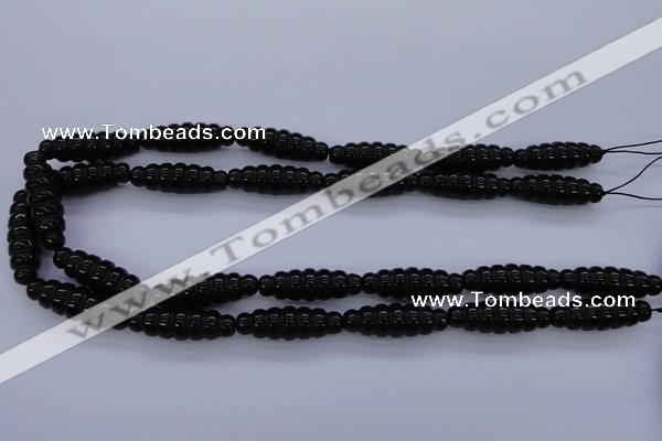 CFG760 15.5 inches 10*30mm carved rice black agate beads