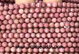 CFW76 15 inches 4mm faceted round pink wooden jasper beads