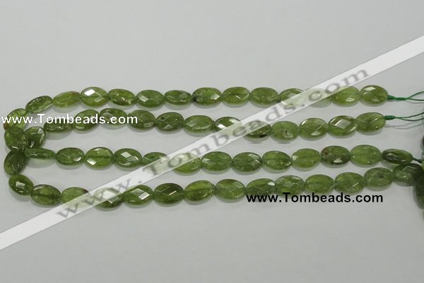 CGA101 15.5 inches 10*14mm faceted oval natural green garnet beads