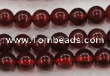 CGA601 15.5 inches 6mm A grade round natural orange garnet beads