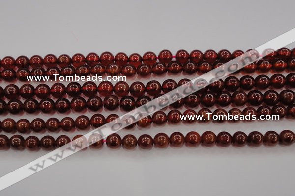 CGA602 15.5 inches 8mm A grade round natural orange garnet beads