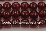 CGA608 15.5 inches 7mm AA grade round natural orange garnet beads