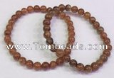 CGB4606 6mm - 7mm round golden rutilated quartz beaded bracelets