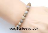 CGB9318 8mm, 10mm matte fossil coral & drum hematite power beads bracelets