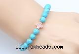 CGB9352 8mm, 10mm blue howlite & cross hematite power beads bracelets