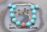CGB9605 12mm round blue howlite & moonstone adjustable bracelets