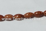 CGS69 15.5 inches 6*10mm rice goldstone beads wholesale
