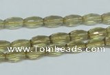 CLQ11 15.5 inches 8*12mm faceted rice natural lemon quartz beads