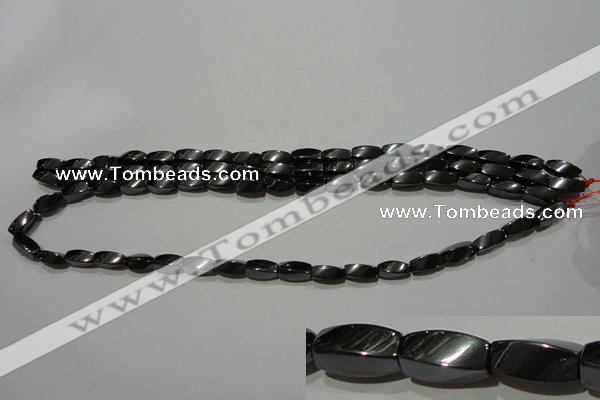 CMH152 15.5 inches 5*11mm twisted rice magnetic hematite beads