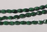 CMN222 15.5 inches 4*6mm faceted rice natural malachite beads