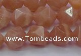 CMS1134 15.5 inches 12mm faceted nuggets peach moonstone beads