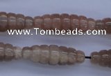 CMS135 15.5 inches 10*30mm carved rice natural moonstone beads