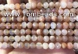 CMS1891 15.5 inches 6.5mm faceted round rainbow moonstone beads