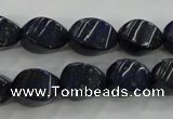 CNL920 15.5 inches 10*14mm twisted rice natural lapis lazuli beads