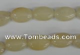 COV68 15.5 inches 10*14mm oval yellow jade beads wholesale