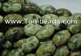 CPS10 15.5 inches 8*12mm rice green peacock stone beads wholesale