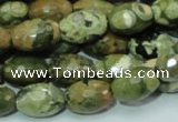 CPS68 15.5 inches 10*15mm faceted rice green peacock stone beads