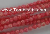 CRC400 15.5 inches 4mm faceted round synthetic rhodochrosite beads