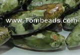 CRH72 15.5 inches 15*40mm faceted rice rhyolite beads wholesale