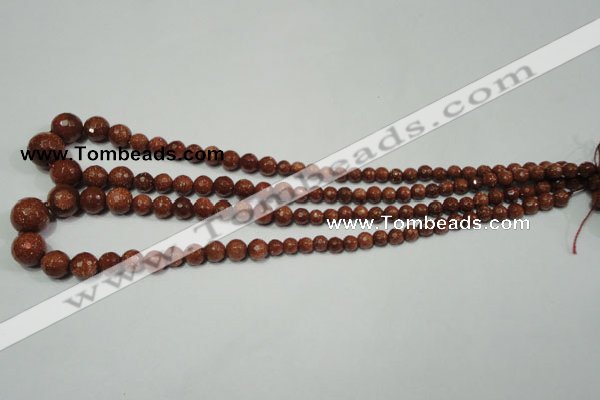 CRO736 15.5 inches 6mm – 14mm faceted round goldstone beads