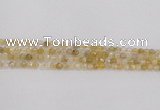 CRU666 15.5 inches 4mm faceted round golden rutilated quartz beads