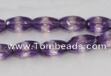 CSA25 15.5 inches 7*12mm faceted rice synthetic amethyst beads