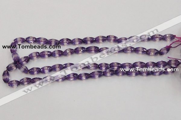 CSA25 15.5 inches 7*12mm faceted rice synthetic amethyst beads