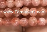 CSS300 15.5 inches 4mm round golden sunstone gemstone beads