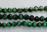 CTE1011 15.5 inches 6mm faceted round dyed green tiger eye beads