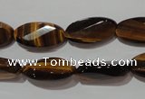 CTE1098 15.5 inches 10*20mm twisted & faceted oval yellow tiger eye beads