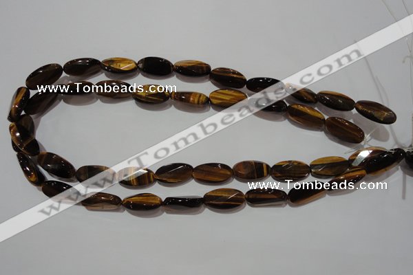 CTE1098 15.5 inches 10*20mm twisted & faceted oval yellow tiger eye beads