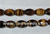 CTE206 15.5 inches 6*8mm faceted rice yellow tiger eye beads