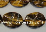 CTE832 15.5 inches 18*25mm wavy oval yellow tiger eye beads