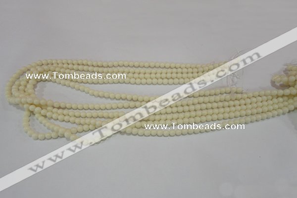 CTU1431 15.5 inches 4mm round synthetic turquoise beads