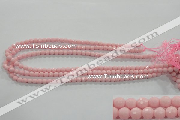 CTU1511 15.5 inches 4mm faceted round synthetic turquoise beads